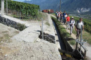  <p>Le Colloque en excursion<br class='manualbr' />sur le Bisse de Clavau<br class='manualbr' />avec Armand Dussex<br class='manualbr' />(photos © aqueduc.info)</p>
